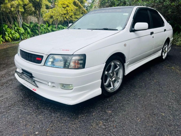 nissan-bluebird-2003-big-4