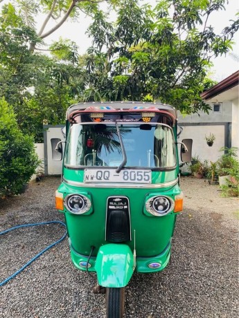 bajaj-4-strock-three-wheel-qq-big-1