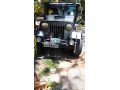 mitsubishi-4dr-j32-small-1