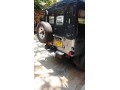 mitsubishi-4dr-j32-small-2