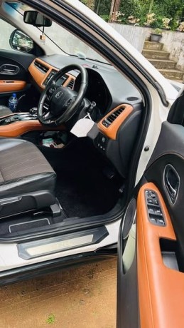 honda-vezel-orange-2014-suv-big-3