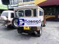 mitsubishi-4dr5-long-wheels-1979-suv-small-1