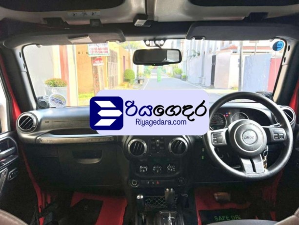 jeep-wrangler-sport-2013-suv-big-4