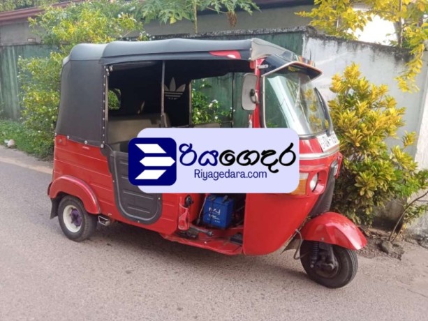 bajaj-re-4-stroke-2010-three-wheel-big-0
