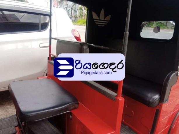 bajaj-re-4-stroke-2010-three-wheel-big-2