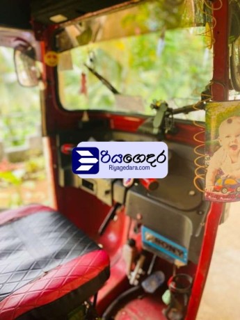 bajaj-4-stroke-2015-three-wheel-big-3