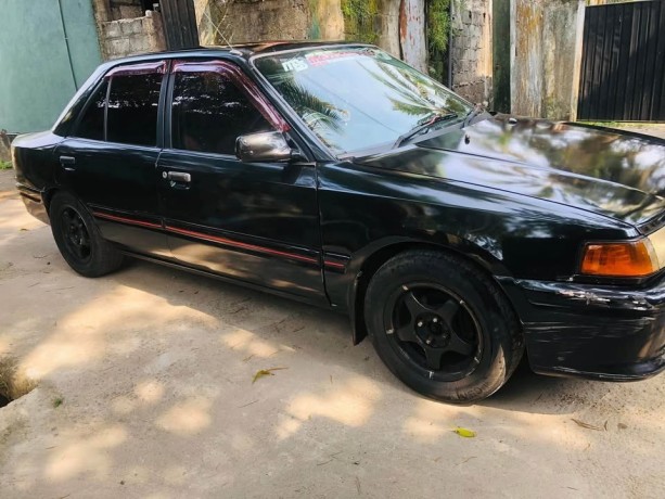 mazda-familiya-bj3p5-big-1