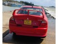mitsubishi-lancer-ck1-small-1