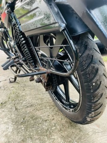 bajaj-discover-135-disc-brake-black-decal-red-for-sale-big-0