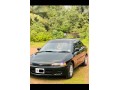 mitsubishi-lancer-ck1-small-1