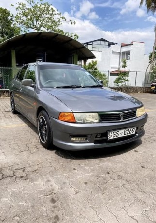 mitsubishi-lancer-ck1-efi-big-0