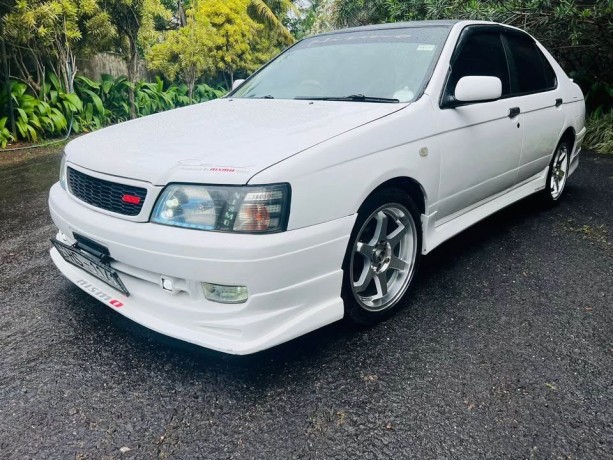 nissan-bluebird-2003-big-4