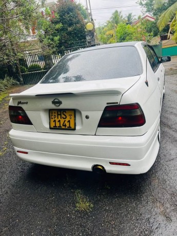 nissan-bluebird-2003-big-0